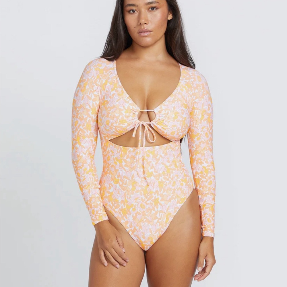 NWT Volcom women’s Coco Surf suit, long sleeve one piece. Orange floral. Melon.